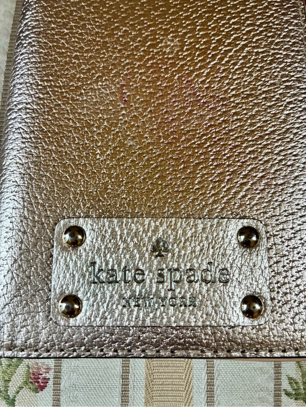 kate spade Metallic Rose Gold Pebbled Passport Cover